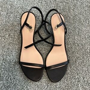 Stuart Weitzman black strappy heel